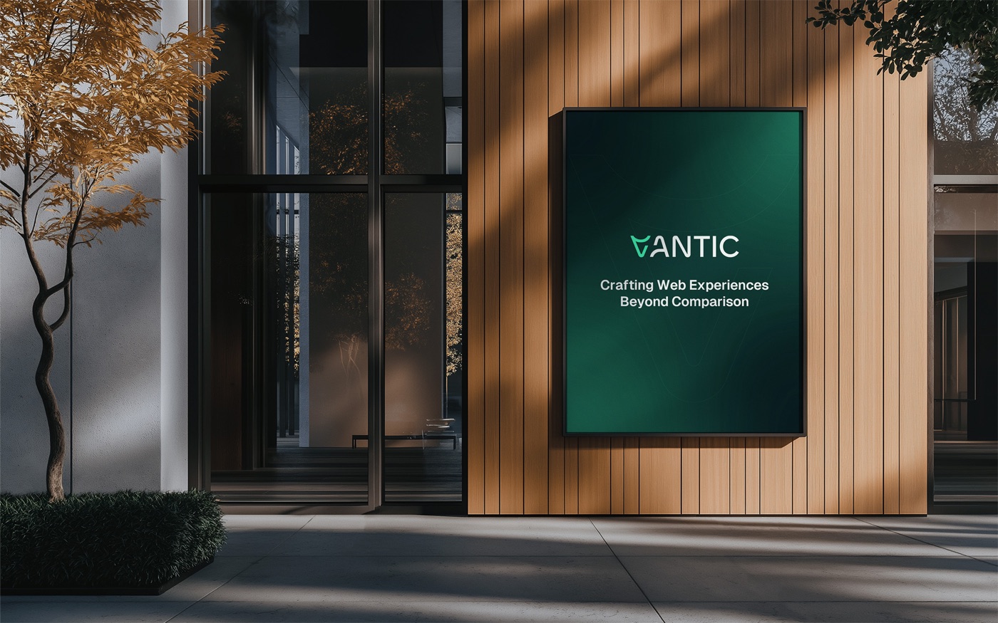 A lit Vantic sign mounted on the timber façade of a building entrance